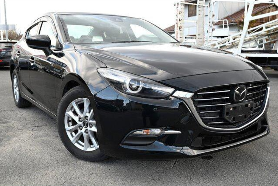 2019 Mazda Axela front and side view 