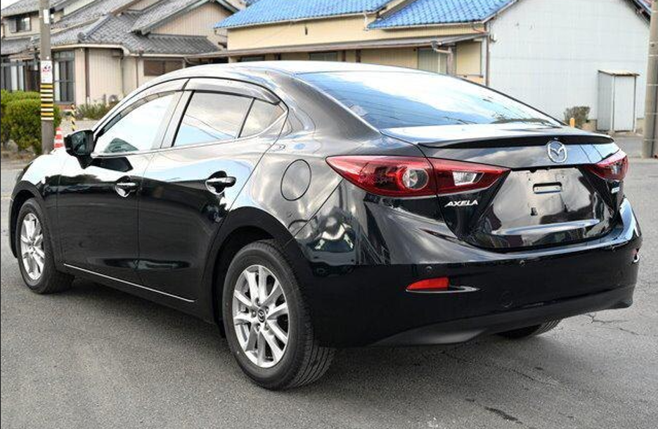 2019 Mazda Axela rear and side view 